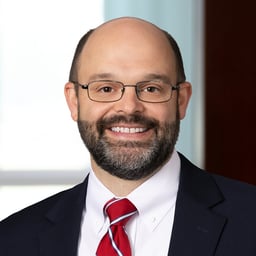 Brett W.  Rector