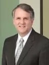 Mark E. Matthews