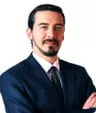 Dr. Claude Micallef Grimaud
