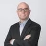 D. Mark Renaud