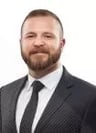 Dustin E. Seguin