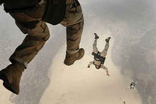 photo of men falling out of plane