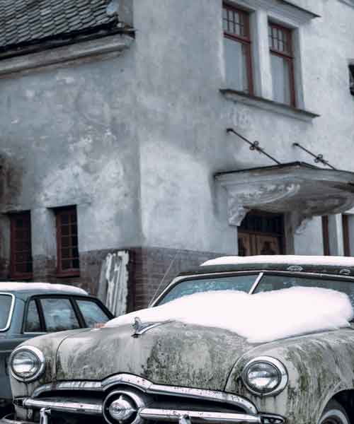 image of classic car with snow of windsheild